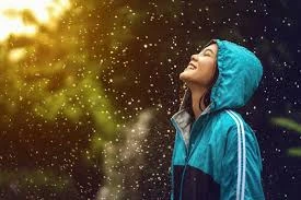 person walking in rain
